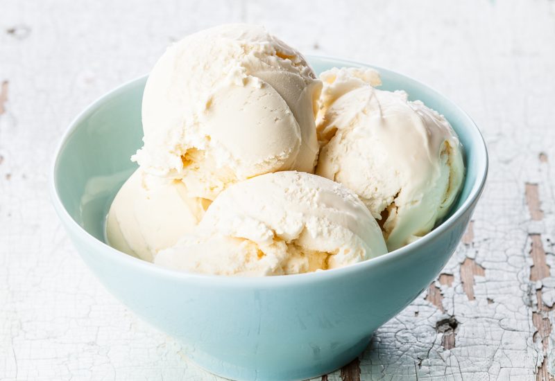 Vanilla ice cream in a blue bowl